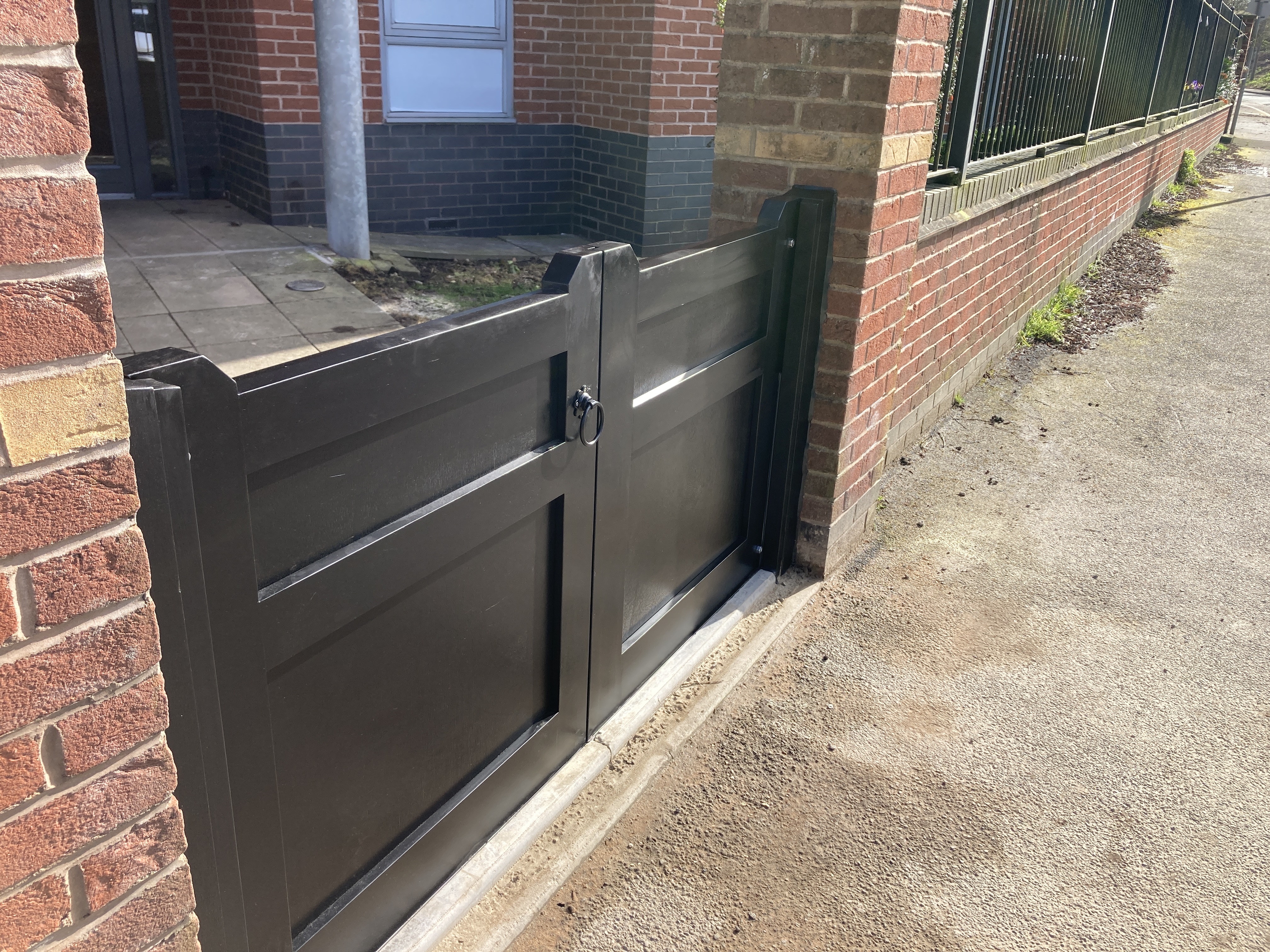Flood gates fitted into a wall